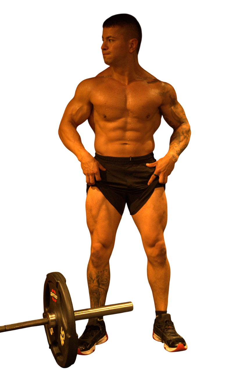 Christian Castano, a muscular fitness influencer and personal trainer, poses with a barbell.